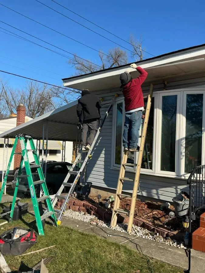 Restoration crew performing exterior repair in Lucas